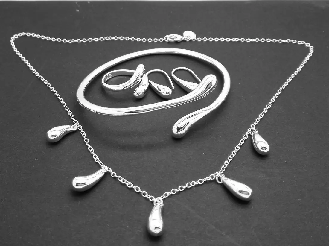 New Wedding Jewelry for Women Beautiful Water Drop Opening Ring Chain Necklace Bracelet Earrings Elegant Fashion Jewelry Sets
New Wedding Jewelry for Women Beautiful Water Drop Opening Ring Chain Necklace Bracelet Earrings Elegant Fashion Jewelry Sets