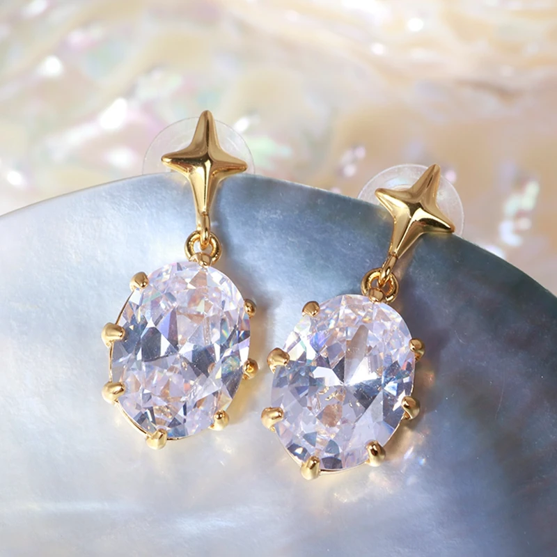 The Girl Heart Cross star is set with sparkling single zircon earrings
The Girl Heart Cross star is set with sparkling single zircon earrings