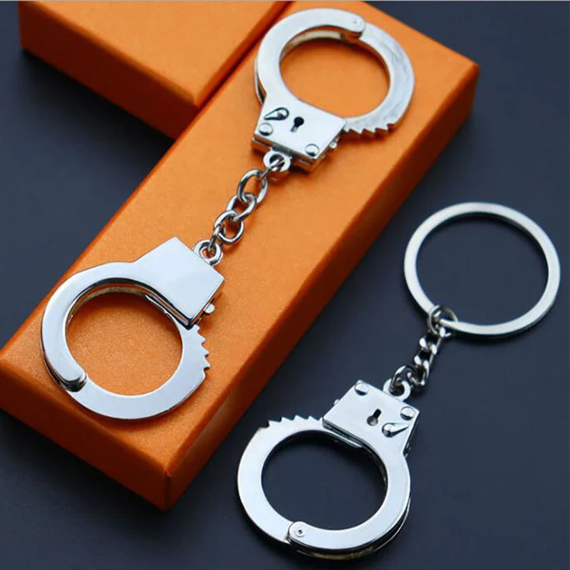 Mini Size Simulator Handcuffs Keychain Jewelry Prisoner Criminal Handcuffs Model Women Men Keyring for Car Key Chain Ring Holder
Mini Size Simulator Handcuffs Keychain Jewelry Prisoner Criminal Handcuffs Model Women Men Keyring for Car Key Chain Ring Holder