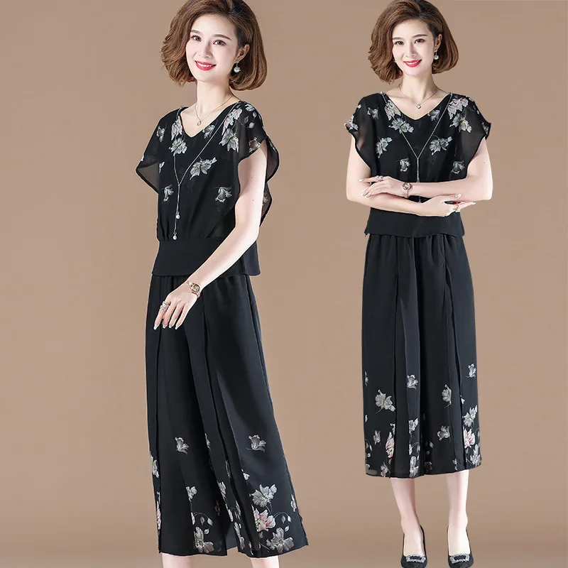 Chiffon short Mom's sleeve summer top 2021 new middle-aged women's skirt suit middle-aged and elderly foreign chiffon shirt
Chiffon short Mom's sleeve summer top 2021 new middle-aged women's skirt suit middle-aged and elderly foreign chiffon shirt