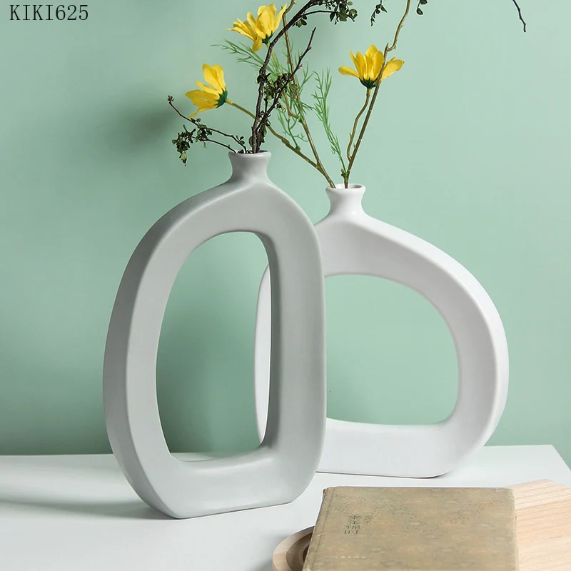 European Style White Hollow Vase Ceramic Flower Arrangement Container Crafts Living Room Countertop Flower Vase Home Decoration
European Style White Hollow Vase Ceramic Flower Arrangement Container Crafts Living Room Countertop Flower Vase Home Decoration