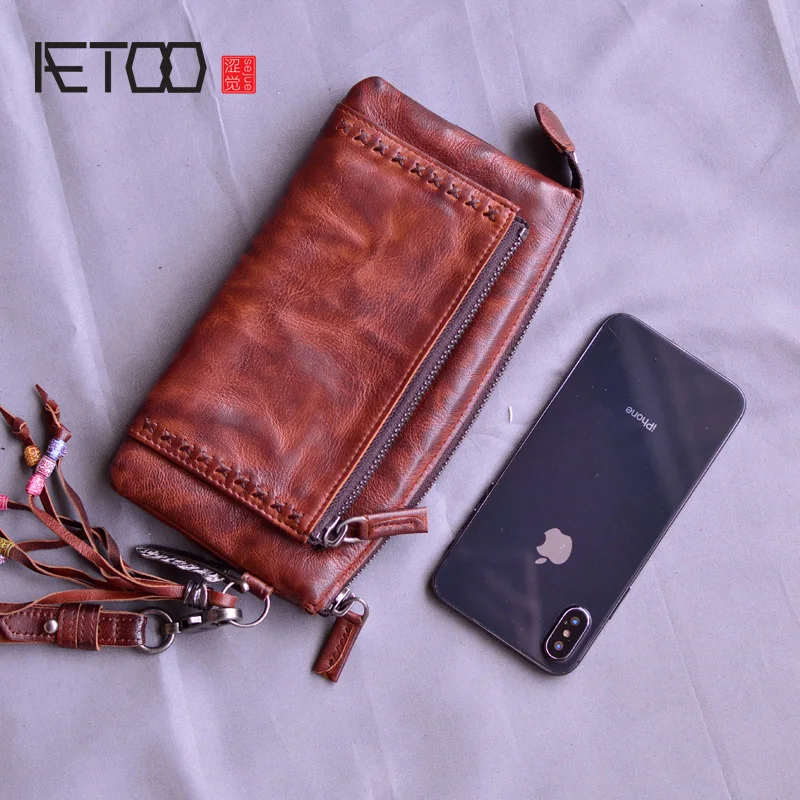 AETOO Handmade vintage coin purse, fringe decoration fold wallet, vegetable tanned leather long zipper clutch
AETOO Handmade vintage coin purse, fringe decoration fold wallet, vegetable tanned leather long zipper clutch