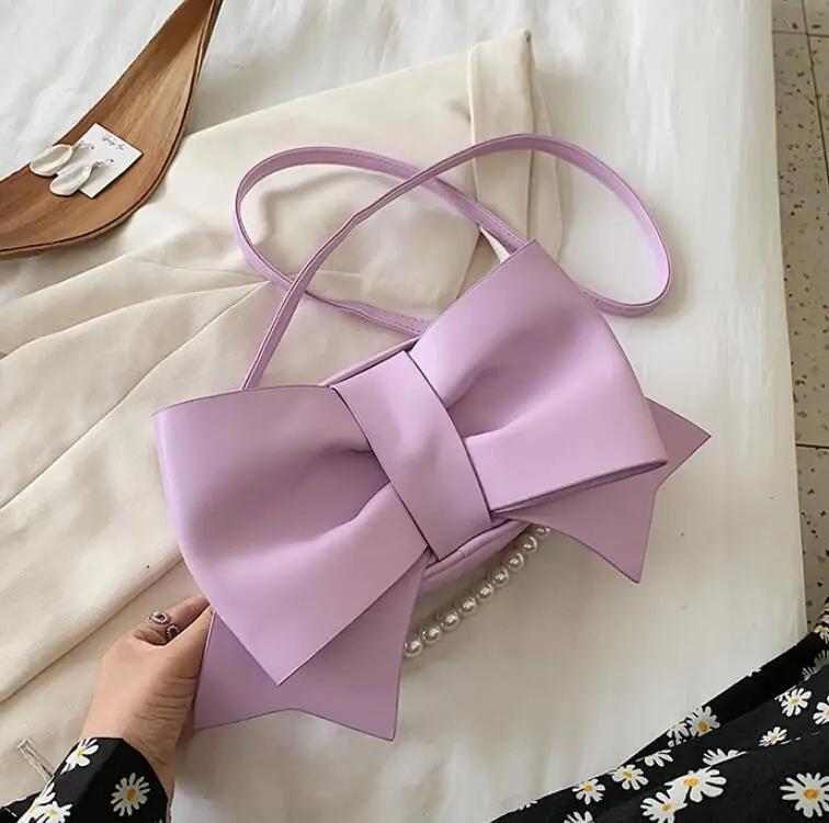 Big Bow Pearl Tote Bag 2021 Fashion New High-quality PU Leather Women's Designer Handbag Elegant Female Shoulder Crossbody Bag
Big Bow Pearl Tote Bag 2021 Fashion New High-quality PU Leather Women's Designer Handbag Elegant Female Shoulder Crossbody Bag