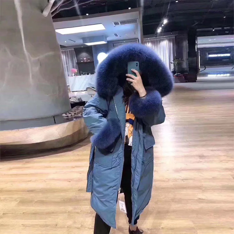 2019 new Korean version of the large fur collar over knee long section thickening belt white duck down jacket
2019 new Korean version of the large fur collar over knee long section thickening belt white duck down jacket