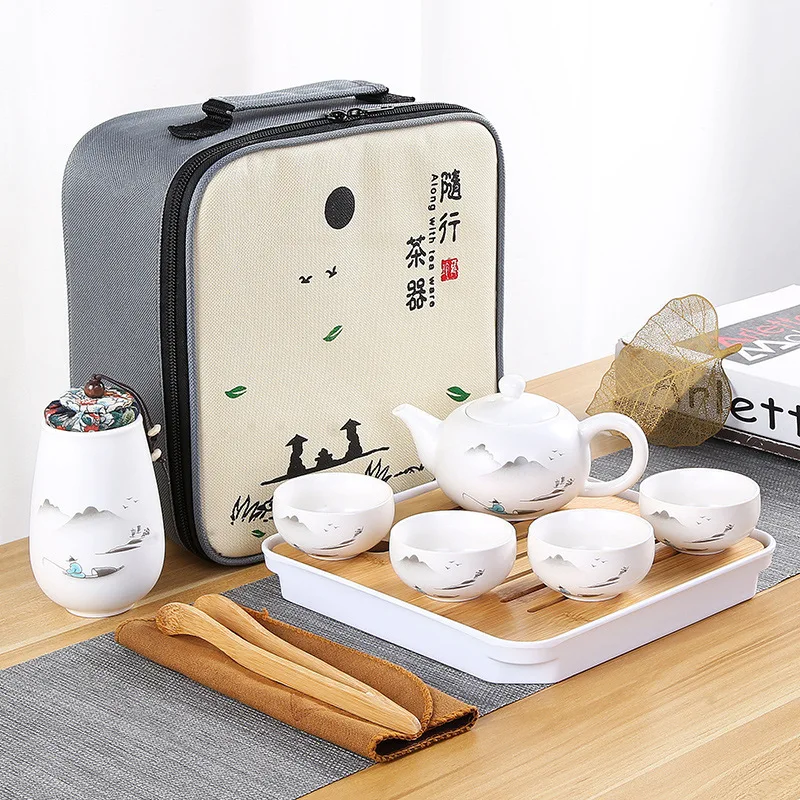 Ceramic Teapot One Pot Four Cup Outdoor Travel Kung Fu Teapot Tote Bag Travel Cup Set Tcup Gift Tea Set Chinese Tea Set Designer
Ceramic Teapot One Pot Four Cup Outdoor Travel Kung Fu Teapot Tote Bag Travel Cup Set Tcup Gift Tea Set Chinese Tea Set Designer