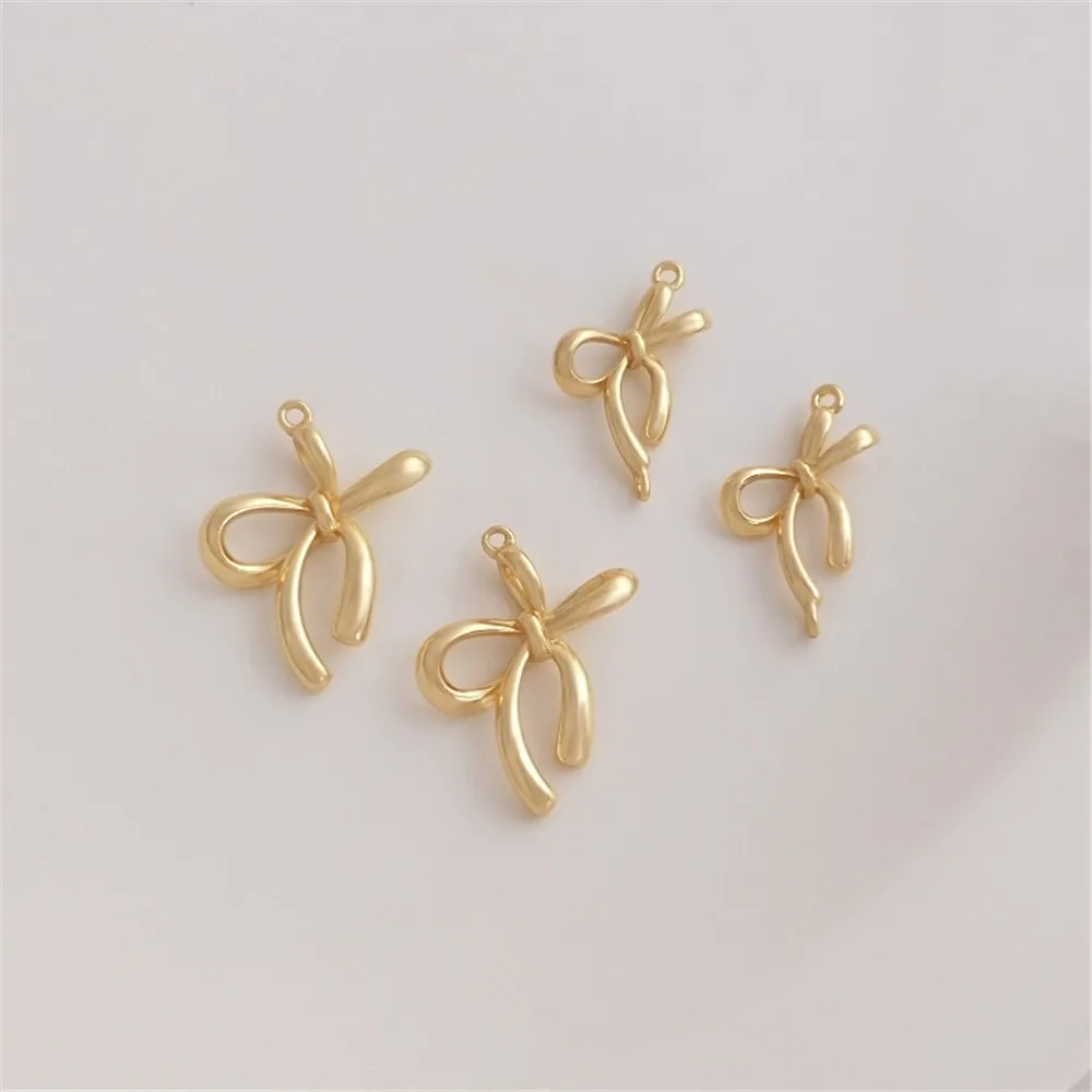 14K Gold Color Three-dimensional line bow pendant bow tie double hanging accessories DIY bracelet earrings earrings accessories
14K Gold Color Three-dimensional line bow pendant bow tie double hanging accessories DIY bracelet earrings earrings accessories