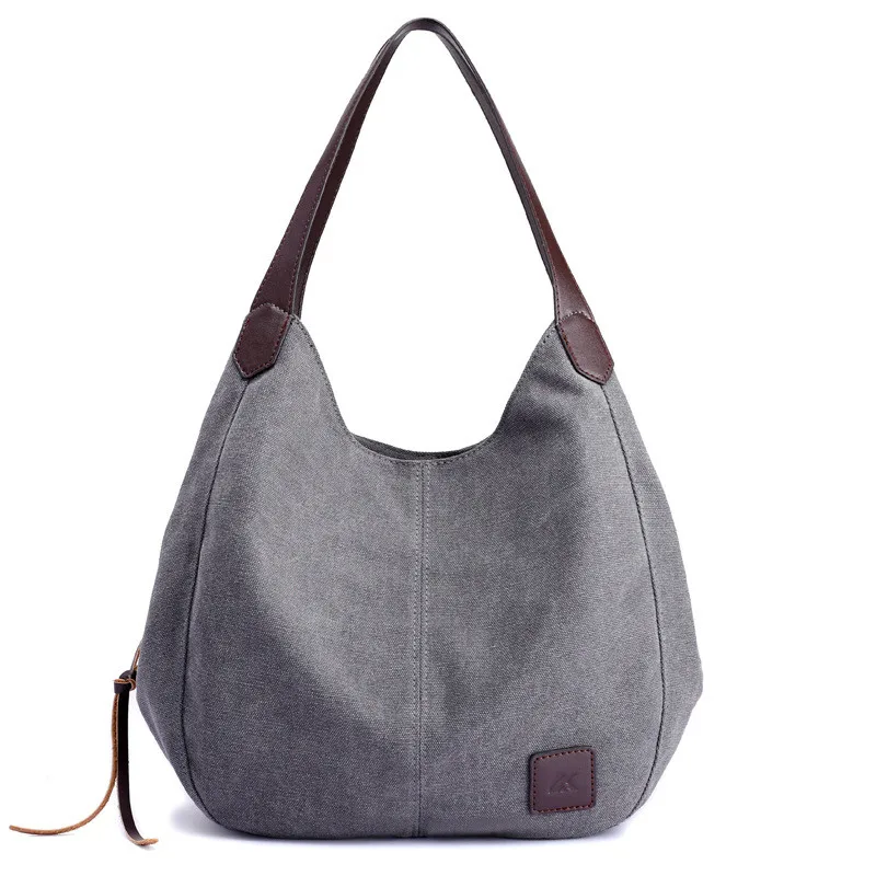 New canvas women's bag fashion versatile literary simple one-shoulder handbag multi-compartment leisure bag
New canvas women's bag fashion versatile literary simple one-shoulder handbag multi-compartment leisure bag