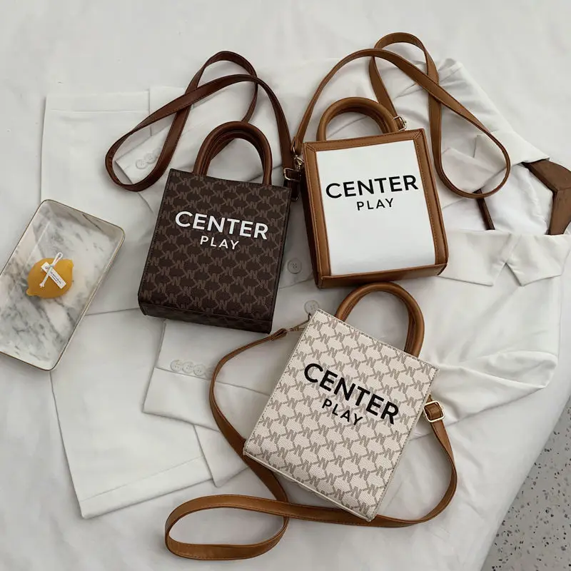 Fashion Lady Bucket Bag with Letter Printing PVC Shoulder Bags Vertical Crossbody Bags for Women Purses and Handbags 
Fashion Lady Bucket Bag with Letter Printing PVC Shoulder Bags Vertical Crossbody Bags for Women Purses and Handbags