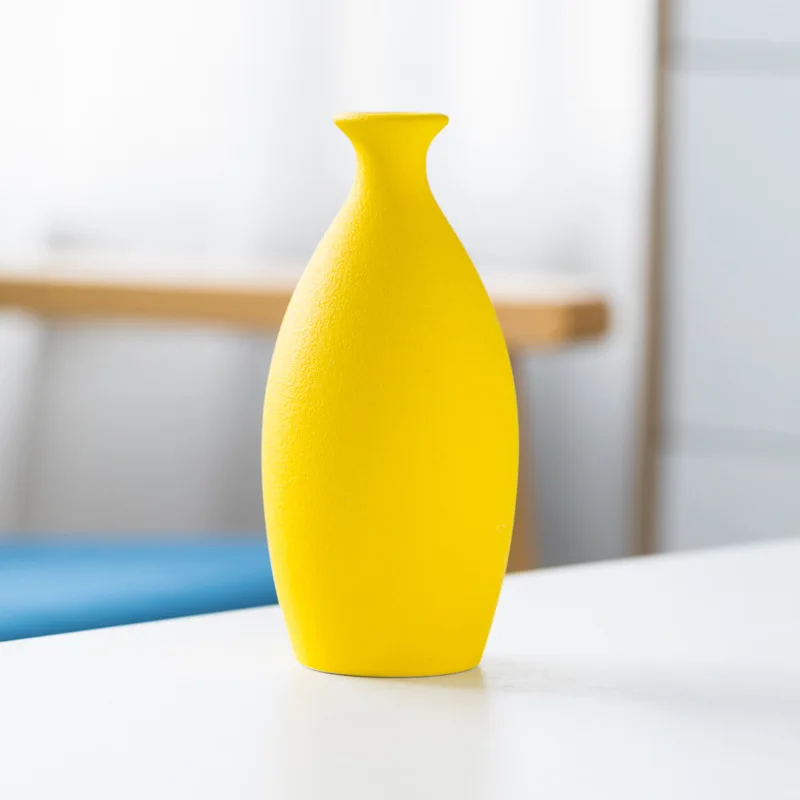 Матовая цветная керамическая ваза AGMSYEU
Матовая цветная керамическая ваза AGMSYEU