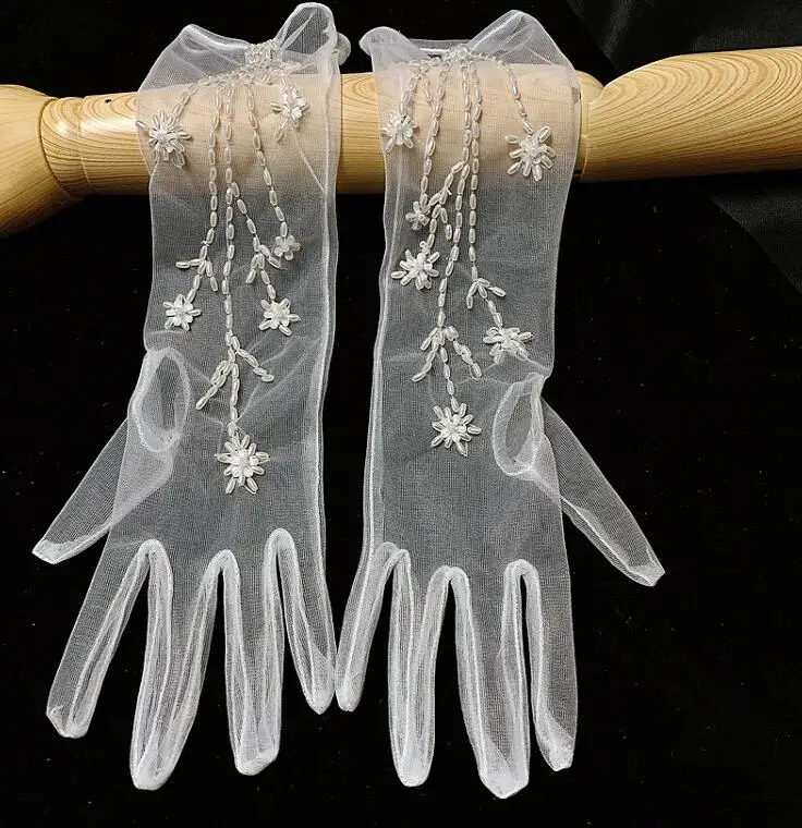 Women's elegant handmade beaded white color sexy mesh glove female spring summer transparent sunscreen lace glove R2894
Women's elegant handmade beaded white color sexy mesh glove female spring summer transparent sunscreen lace glove R2894