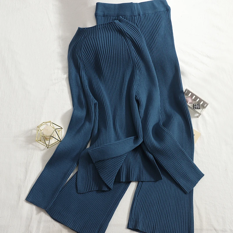 2021 fall/winter pullover elastic outer split blouse + solid color wild straight leg pants trousers knitted two-piece female
2021 fall/winter pullover elastic outer split blouse + solid color wild straight leg pants trousers knitted two-piece female