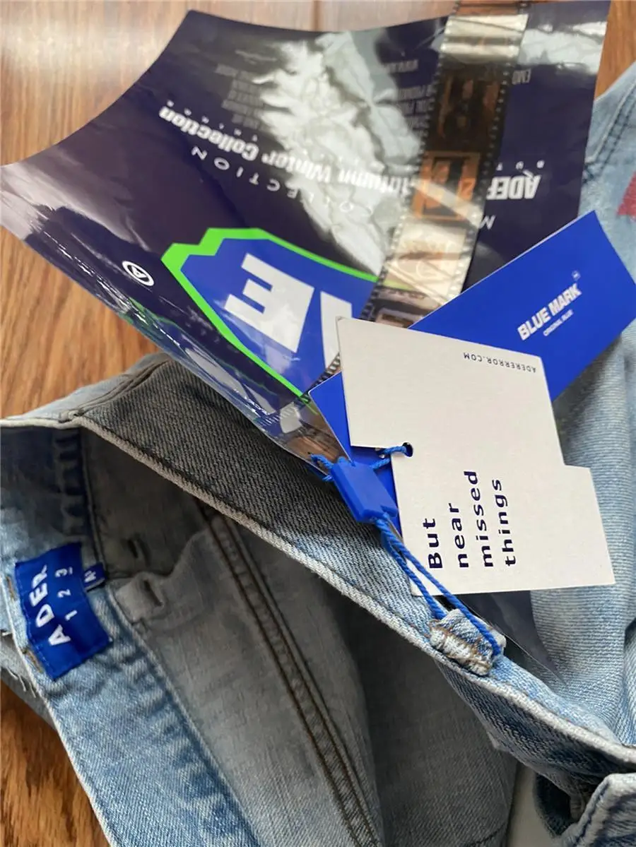 Hole Graffiti Embroidery Adererror Jeans Men Women Best Quality Back Split Denim Ader Error Pants
Hole Graffiti Embroidery Adererror Jeans Men Women Best Quality Back Split Denim Ader Error Pants