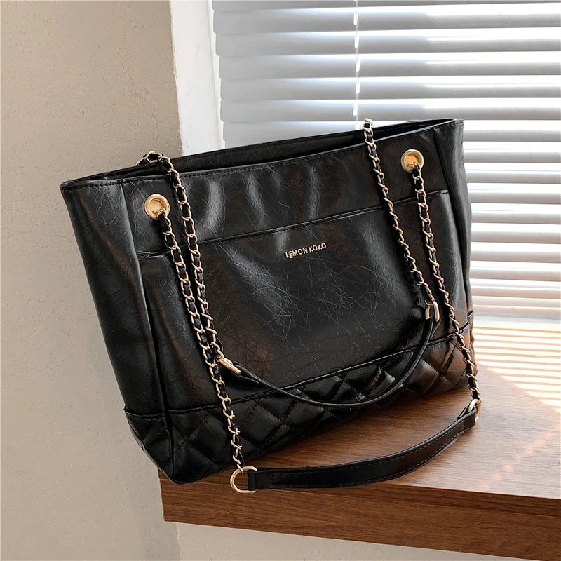 Luxury Designer Big Quilted Chain Shoulder Bags For Women Famous Brand Large Capacity Simple Travel Tote Work Ladies Handbags
Luxury Designer Big Quilted Chain Shoulder Bags For Women Famous Brand Large Capacity Simple Travel Tote Work Ladies Handbags