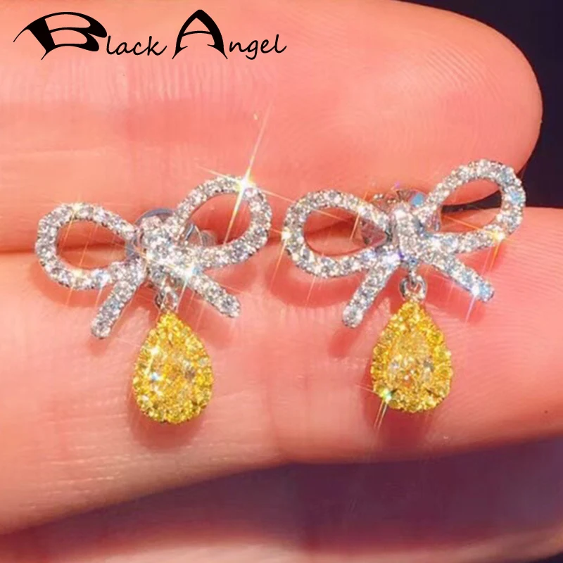 BLACK ANGEL 925 Silver Shiny Bling Bowknot Inset Luxury Citrine Pink CZ Gemstone Stud Earrings for Women Jewelry Wedding Gift
BLACK ANGEL 925 Silver Shiny Bling Bowknot Inset Luxury Citrine Pink CZ Gemstone Stud Earrings for Women Jewelry Wedding Gift