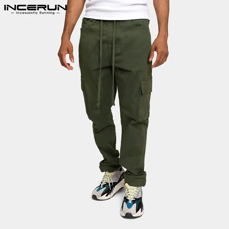 2021 Men Casual Pants Multi Pockets Drawstring Streetwear Joggers Loose Cargo Pants Solid Color Pantalones Hombre S-5XL INCERUN
2021 Men Casual Pants Multi Pockets Drawstring Streetwear Joggers Loose Cargo Pants Solid Color Pantalones Hombre S-5XL INCERUN