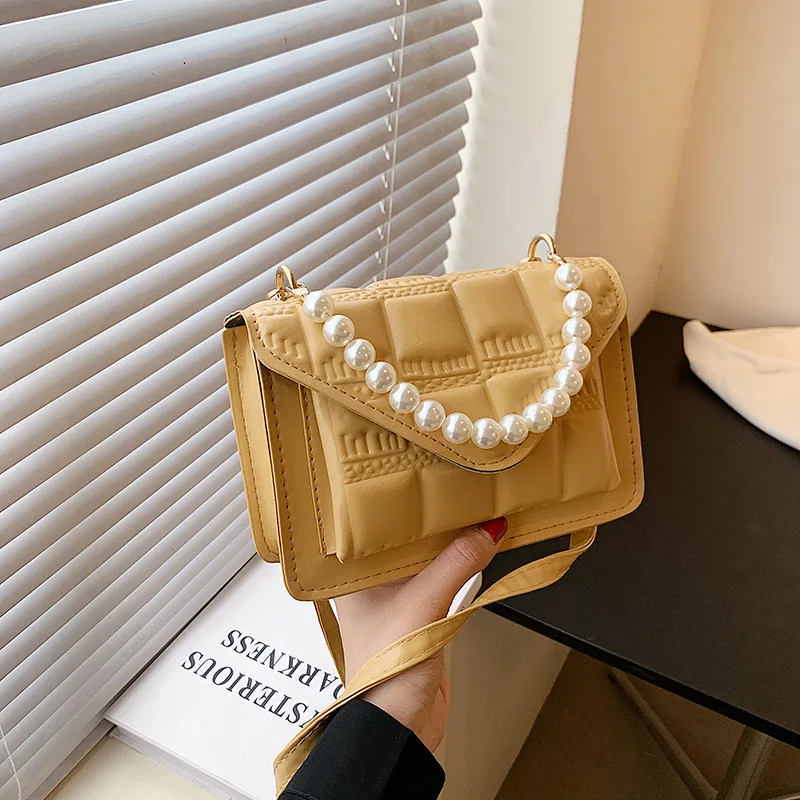 Fashion Embossed Female Bag PU Leather Pearl Shoulder Bag 2021 New Texture Buckle Crossbody Bags for Women Luxury Design Handbag 
Fashion Embossed Female Bag PU Leather Pearl Shoulder Bag 2021 New Texture Buckle Crossbody Bags for Women Luxury Design Handbag