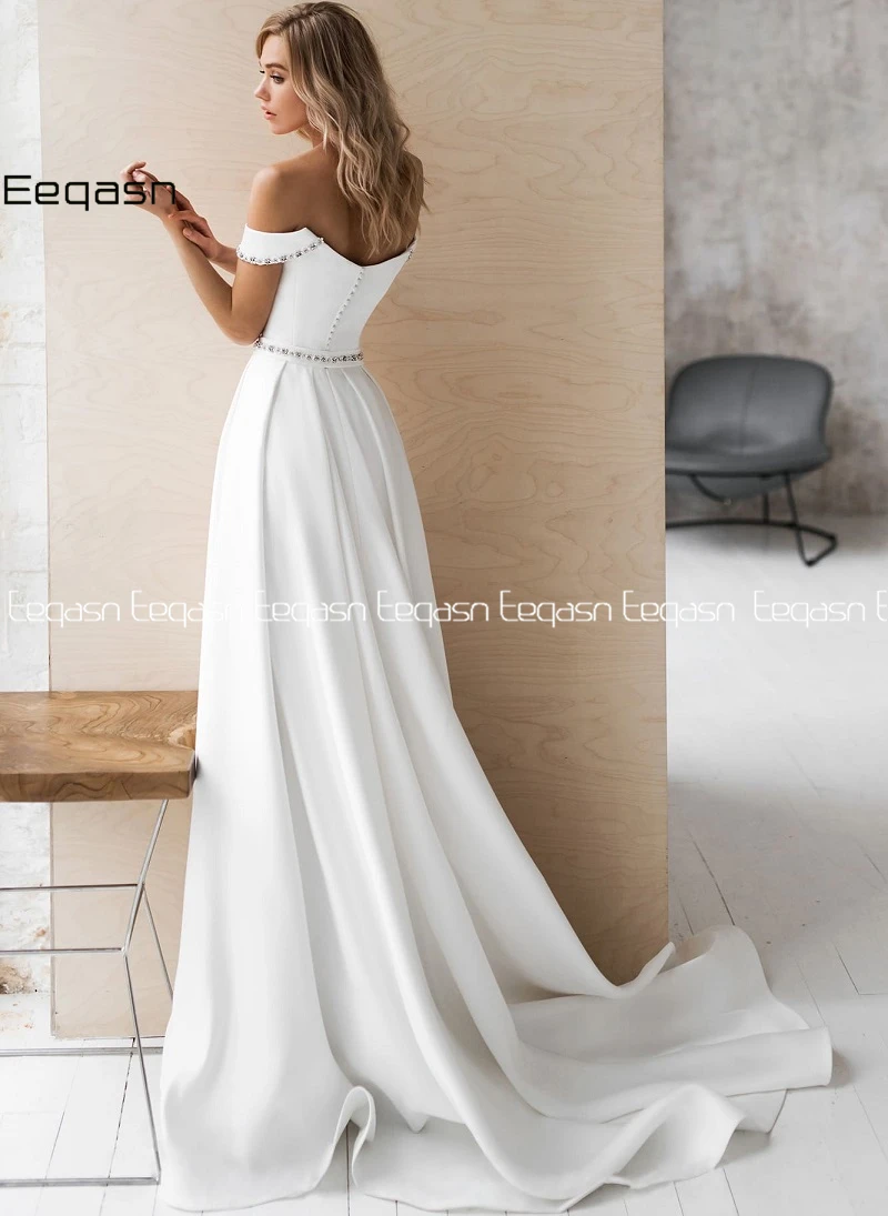 Elegant Crystal Satin Wedding Dress Long 2020 Off the Shoulder A-Line Princess Bridal Gown with Pockets Plus Size
Elegant Crystal Satin Wedding Dress Long 2020 Off the Shoulder A-Line Princess Bridal Gown with Pockets Plus Size
