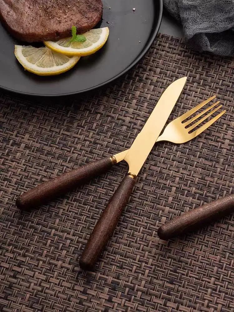 Western Cutlery Knife Fork Spoon Set Wooden Handle Golden Steak Knife Fork Household Stainless Steel Cutlery 3 Pieces Set
Western Cutlery Knife Fork Spoon Set Wooden Handle Golden Steak Knife Fork Household Stainless Steel Cutlery 3 Pieces Set