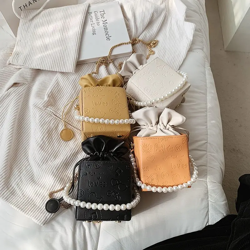 Mini Chain Tote Bag For Women 2021 Summer Box Design Female Shoulder Crossbody Bag With Pearl Handle Ladies Handbag and Purse
Mini Chain Tote Bag For Women 2021 Summer Box Design Female Shoulder Crossbody Bag With Pearl Handle Ladies Handbag and Purse