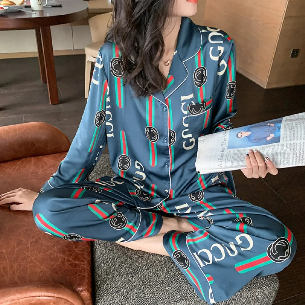 summer ice silk pajamas women mouse silk sexy thin section lapel cardigan short sleeve trousers home service suit
summer ice silk pajamas women mouse silk sexy thin section lapel cardigan short sleeve trousers home service suit