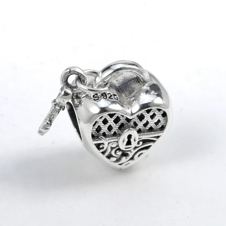 Genuine 925 Sterling Silver Bead Charm Vintage Openwork Love Heart Lock & Key Bead Fit pan Bracelet & Necklace Diy Jewelry
Genuine 925 Sterling Silver Bead Charm Vintage Openwork Love Heart Lock & Key Bead Fit pan Bracelet & Necklace Diy Jewelry