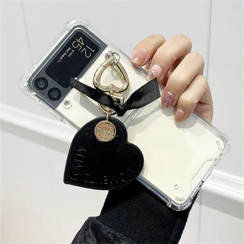 Luxury Love Heart Hand Chains Phone Shell Case For Samsung Galaxy Zflip3 ZFlip Shockproof Transparent Cover ZFlip3 5G Etui Funda
Luxury Love Heart Hand Chains Phone Shell Case For Samsung Galaxy Zflip3 ZFlip Shockproof Transparent Cover ZFlip3 5G Etui Funda
