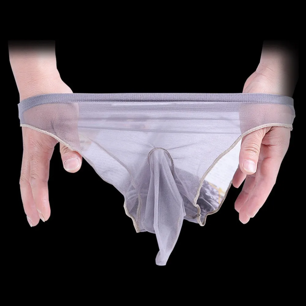Sexy Mens Ice Silk See Through Sheath Briefs Elephant Nose Underwear Gay Men Pouch Thong G-Strings Erotic Ultrathin Underpants
Sexy Mens Ice Silk See Through Sheath Briefs Elephant Nose Underwear Gay Men Pouch Thong G-Strings Erotic Ultrathin Underpants