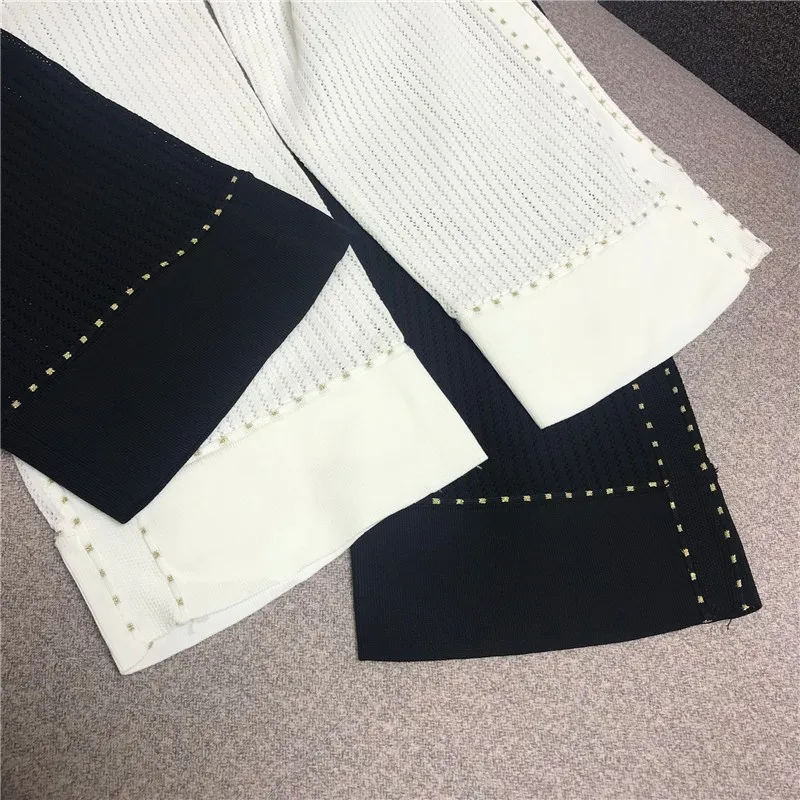 Temperament wide leg pants suit female 2020 Summer New Metal buckle Hollow short-sleeved sweater + wide leg Pants two-piece Set
Temperament wide leg pants suit female 2020 Summer New Metal buckle Hollow short-sleeved sweater + wide leg Pants two-piece Set