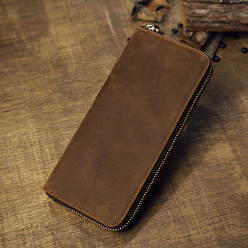 Handmade cowhide long zipper crazy horse leather wallet simple youth leather handbag men's retro casual mobile phone bag
Handmade cowhide long zipper crazy horse leather wallet simple youth leather handbag men's retro casual mobile phone bag