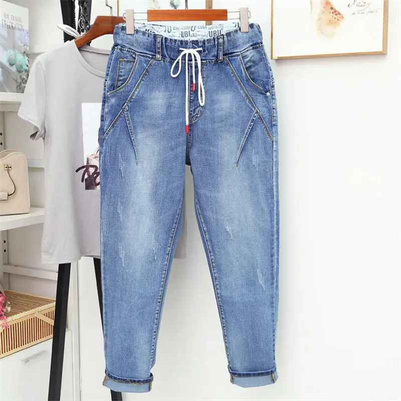 New Plus Size Jeans Female Loose Stretch High Waist Denim Harem Pants Women Streetwear Mom Jeans Trousers Ropa Mujer 5XL Q4009
New Plus Size Jeans Female Loose Stretch High Waist Denim Harem Pants Women Streetwear Mom Jeans Trousers Ropa Mujer 5XL Q4009