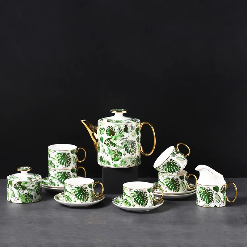 Nordic Coffee Pot and Coffee Cup Saucer Set Sugar bowl Creative Gold Rim Green Leaf Flower Tea Set Coffeeware Ceramic Gift
Nordic Coffee Pot and Coffee Cup Saucer Set Sugar bowl Creative Gold Rim Green Leaf Flower Tea Set Coffeeware Ceramic Gift