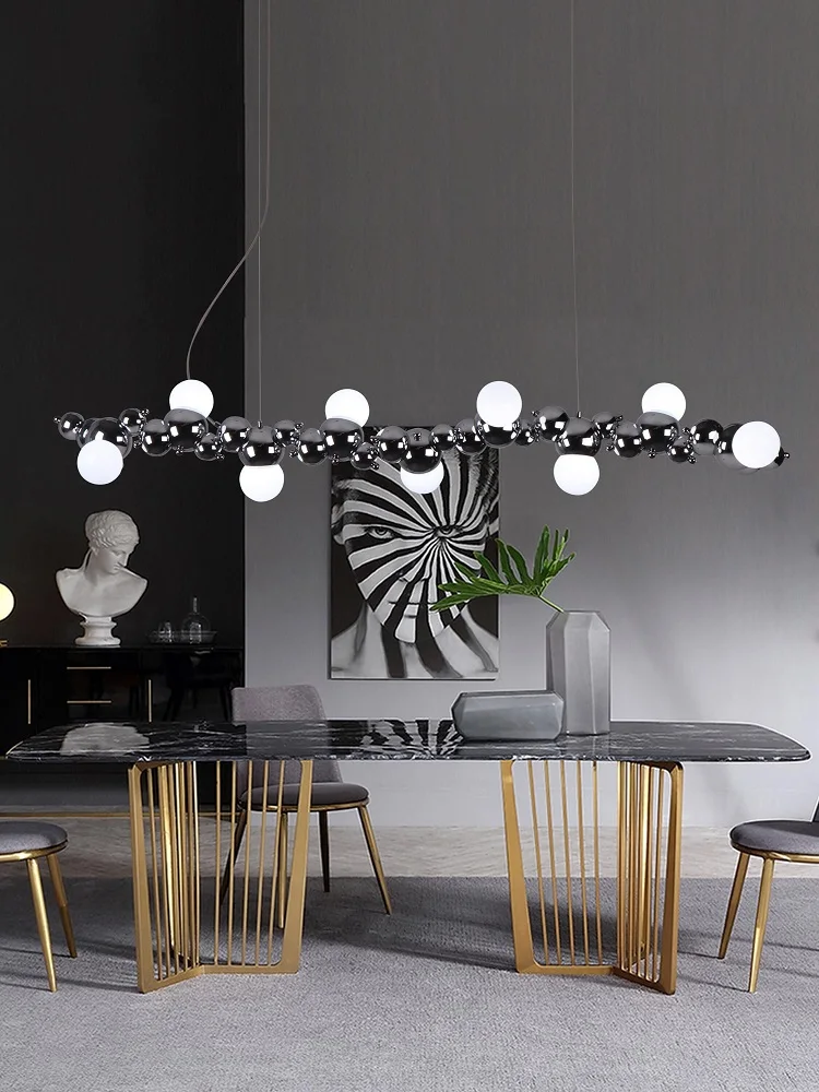 Light luxury bar chandelier long table restaurant caterpillar postmodern chandelier design personality creative lamps
Light luxury bar chandelier long table restaurant caterpillar postmodern chandelier design personality creative lamps