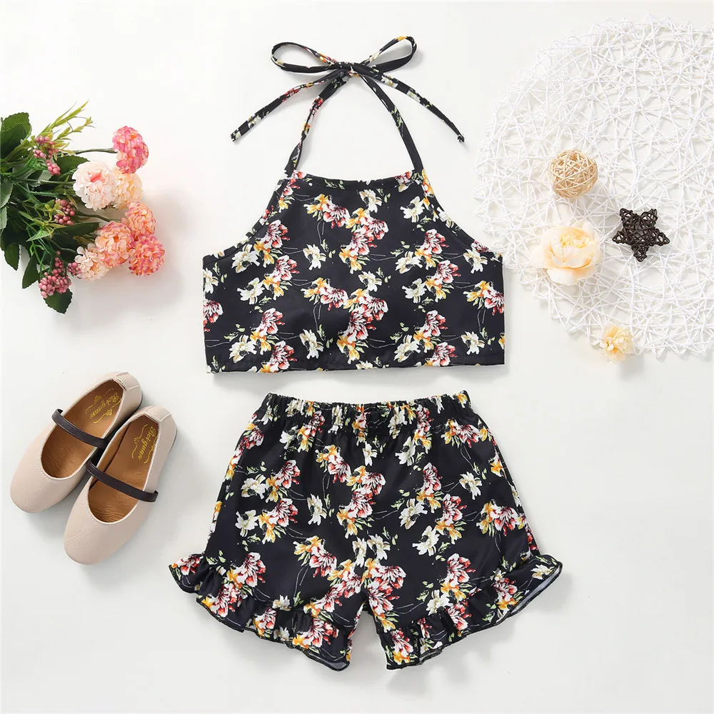 New Girl’s Summer Two Piece Set Fashion Floral Printed Halter Cropped Camisole and Short Pants Kid Girls Casual Clothing Set 
New Girl’s Summer Two Piece Set Fashion Floral Printed Halter Cropped Camisole and Short Pants Kid Girls Casual Clothing Set