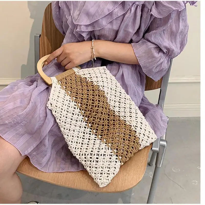 Women's Bag Wooden Handle Weave Beach Handbags For Women Hollow Out Straw Bag Women Summer Rattan Women's Handbags 
Women's Bag Wooden Handle Weave Beach Handbags For Women Hollow Out Straw Bag Women Summer Rattan Women's Handbags