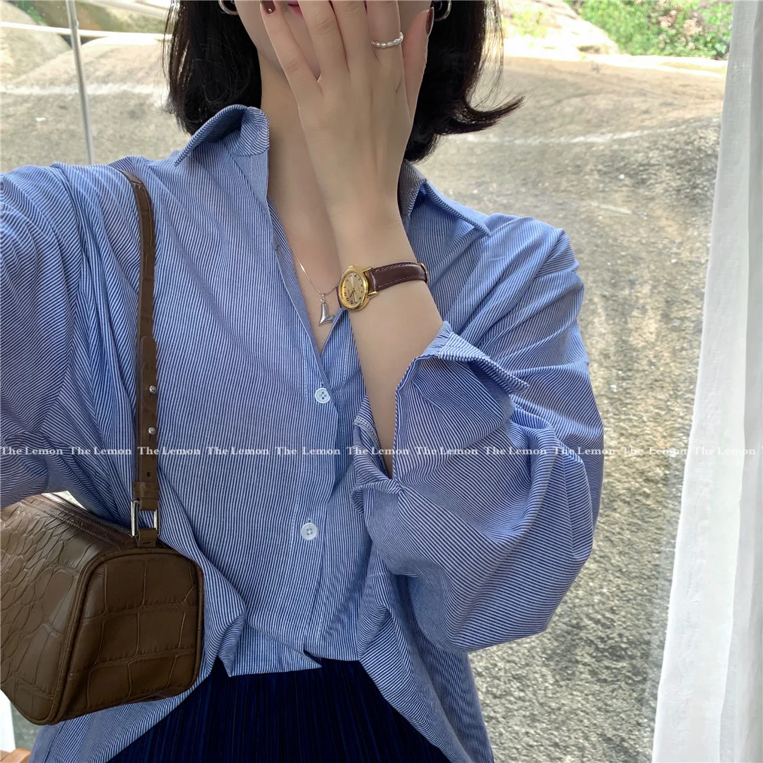 Thelemon Early Autumn New 2021 Korean Style Loose All-matching Graceful Striped Shirt Women Without Bags.
Thelemon Early Autumn New 2021 Korean Style Loose All-matching Graceful Striped Shirt Women Without Bags.