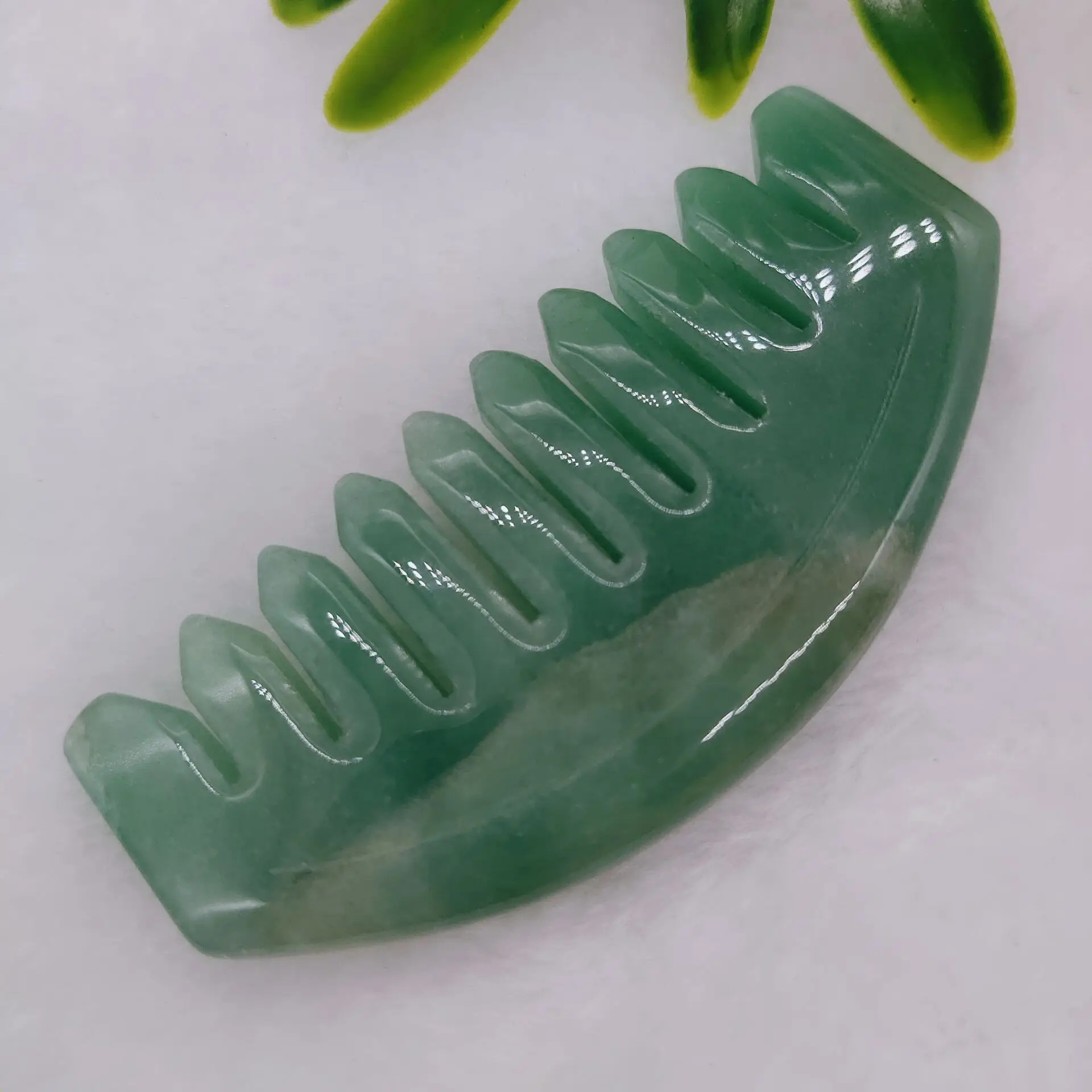 Natural hand polishing Dongling jade crystal reiki comb healing quartz comb head massage care hair sand scraper tool
Natural hand polishing Dongling jade crystal reiki comb healing quartz comb head massage care hair sand scraper tool
