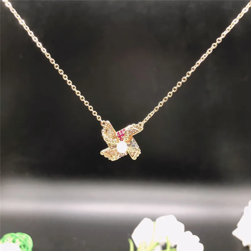 High Quality Women's Inlaid Rhinestone Gold Windmill Pendant Necklace Simple Temperament Glass Pearl Winter Sweater Necklace
High Quality Women's Inlaid Rhinestone Gold Windmill Pendant Necklace Simple Temperament Glass Pearl Winter Sweater Necklace