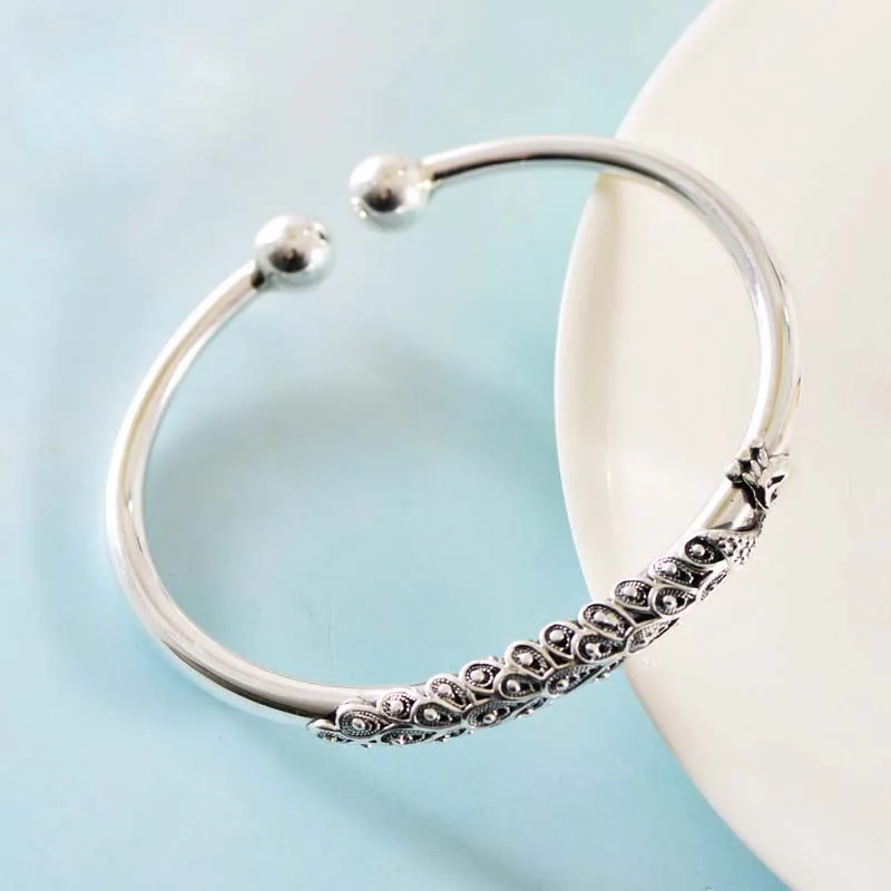 Real S999 Sterling Silver National Style Fashion Personality Peacock Open Screen Solid Bracelets Exquisite Party Jewelry
Real S999 Sterling Silver National Style Fashion Personality Peacock Open Screen Solid Bracelets Exquisite Party Jewelry