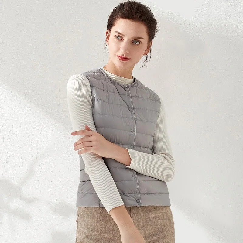 Autumn and winter 2021 new round neck lightweight down vest women's wear Korean V-neck short Vest Large jacket
Autumn and winter 2021 new round neck lightweight down vest women's wear Korean V-neck short Vest Large jacket