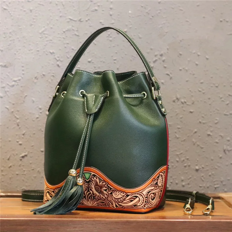 Red fire fish hand carved leather bucket bag 2021 new leather female tassel messenger bag leather carved single shoulder women's
Red fire fish hand carved leather bucket bag 2021 new leather female tassel messenger bag leather carved single shoulder women's