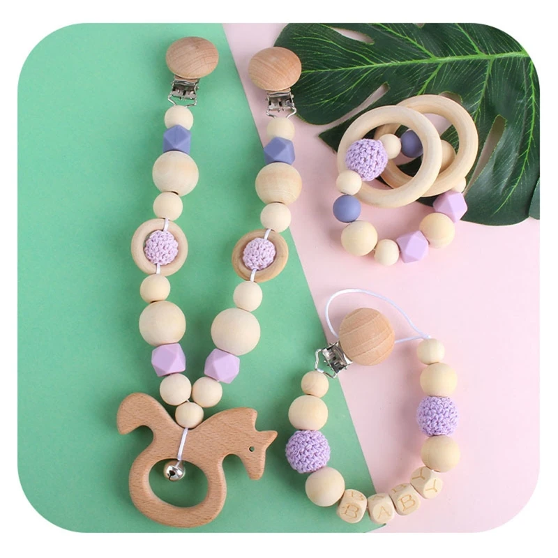 3Pcs Baby Stroller Hanging Clip Pendant Mobile Rattle Teether Pacifier Chain Wooden Ring Bracelet Dummy Holder 
3Pcs Baby Stroller Hanging Clip Pendant Mobile Rattle Teether Pacifier Chain Wooden Ring Bracelet Dummy Holder