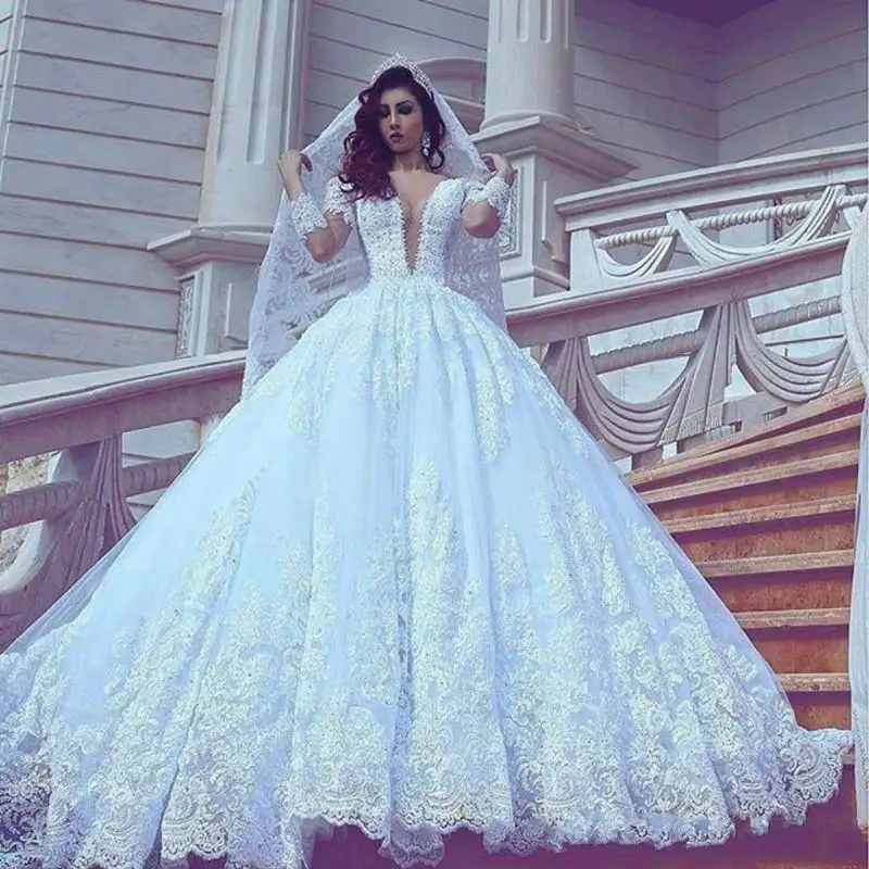 Long Sleeve Wedding Dresses Deep V-Neck Lace Saudi Arabia Appliques Wedding Dress Plus Size Ball Custom Made Formal Bridal Gown 
Long Sleeve Wedding Dresses Deep V-Neck Lace Saudi Arabia Appliques Wedding Dress Plus Size Ball Custom Made Formal Bridal Gown