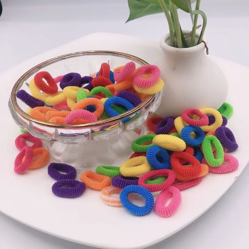 100Pcs/set Children Hair Ties Korean Candy Color Seamless Hair Band Stretch Fabric Hair Rubber Fashion Headwear Hair Accessories 
100Pcs/set Children Hair Ties Korean Candy Color Seamless Hair Band Stretch Fabric Hair Rubber Fashion Headwear Hair Accessories