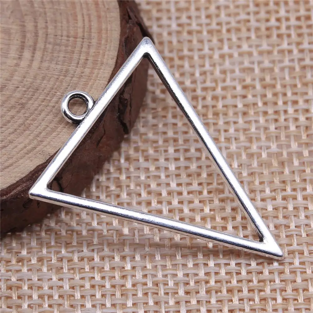 10Pcs 34x25mm Antique Silver Color Hollow Geometric Triangle Earring Accessories Charms For DIY Bracelet Necklace Making
10Pcs 34x25mm Antique Silver Color Hollow Geometric Triangle Earring Accessories Charms For DIY Bracelet Necklace Making