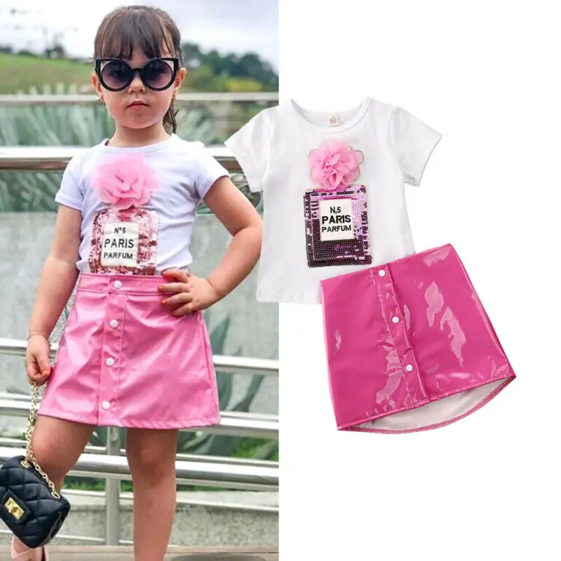 Toddler Kids Baby Girl 3D Flower Tops Short Sleeve Tee Shirt Leather Button Skirt Outfit Clothes Summer Girls Suit
Toddler Kids Baby Girl 3D Flower Tops Short Sleeve Tee Shirt Leather Button Skirt Outfit Clothes Summer Girls Suit