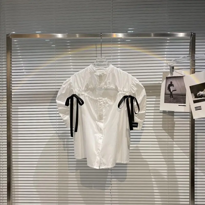 Elegant White Cotton Shirt for Women 2021 Summer New Lace-up Bow Sexy Hollow Puff Short Sleeve Blouse Loose Casual Ladies Tops
Elegant White Cotton Shirt for Women 2021 Summer New Lace-up Bow Sexy Hollow Puff Short Sleeve Blouse Loose Casual Ladies Tops