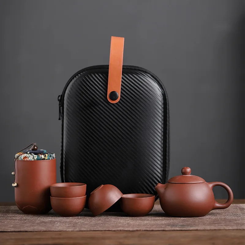 Purple Sand Tea Cups Ceramic Portable Teapot Set Outdoor Travel Gaiwan Tea Cups of Tea Ceremony Teacup Kung Fu Tea Set Gift
Purple Sand Tea Cups Ceramic Portable Teapot Set Outdoor Travel Gaiwan Tea Cups of Tea Ceremony Teacup Kung Fu Tea Set Gift