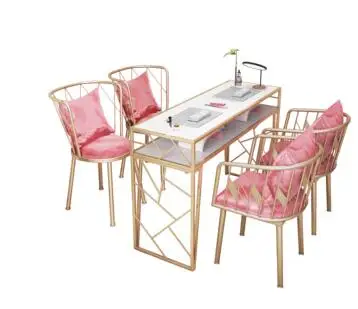 North Europe and America A shop table and chair set simple marble custom nail art table net red ins iron gold manicure station
North Europe and America A shop table and chair set simple marble custom nail art table net red ins iron gold manicure station