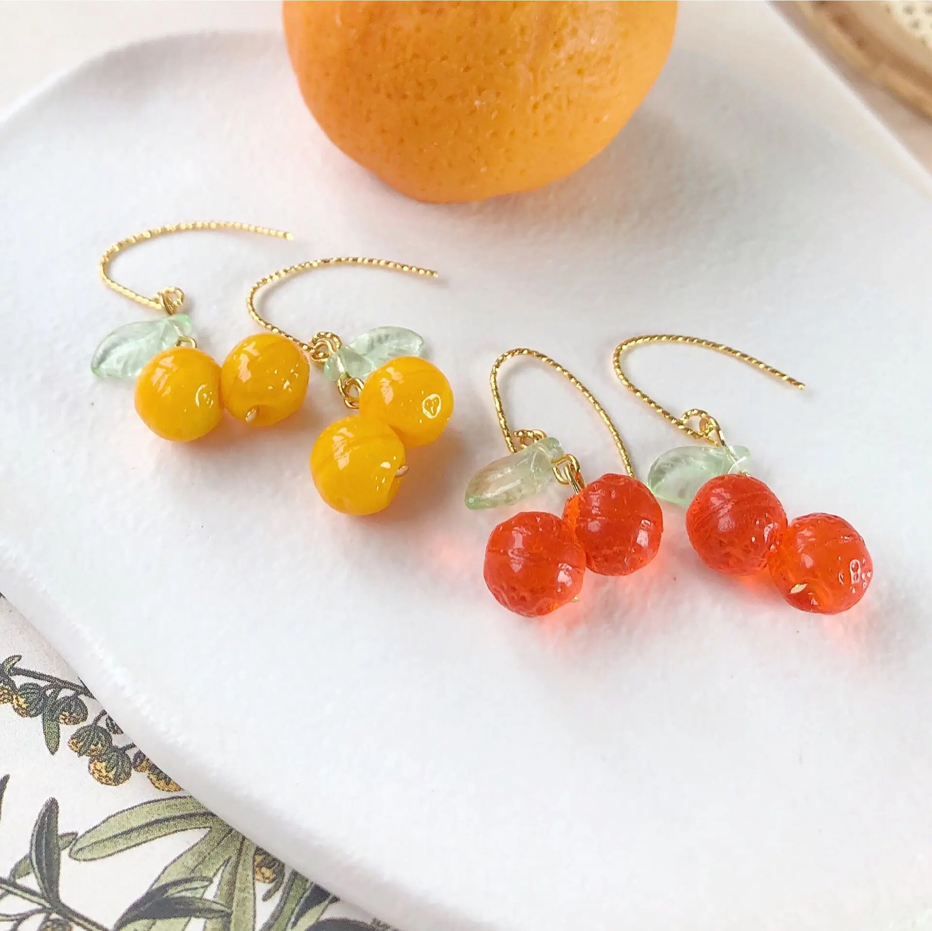 2021 Autumn Fashion Japanese Style Youth Girl Lolita Fruit Jewelry Small Orange Earrings Anime Ear Pendant
2021 Autumn Fashion Japanese Style Youth Girl Lolita Fruit Jewelry Small Orange Earrings Anime Ear Pendant