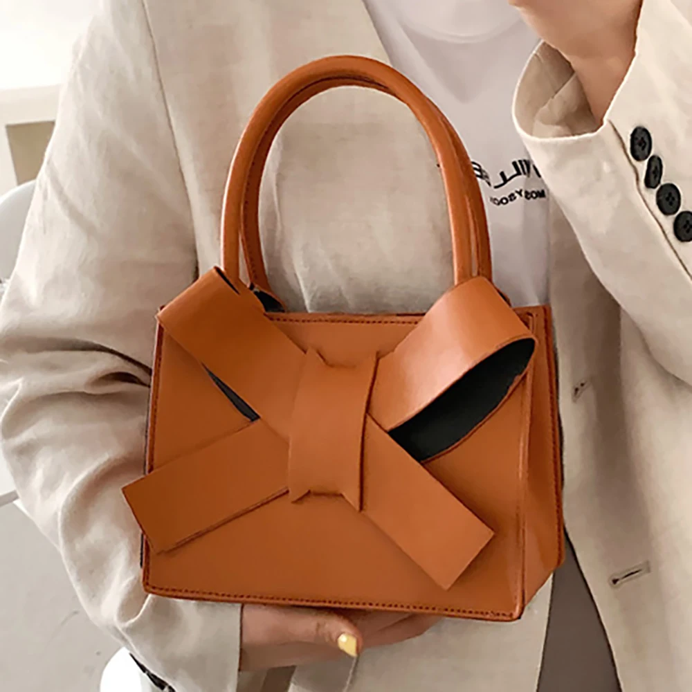 Fashion Women Leather Top-handle Bag Portable Pure Color Hasp Flap Handbags Female Casual Bowknot Street Travel Shopping Purses
Fashion Women Leather Top-handle Bag Portable Pure Color Hasp Flap Handbags Female Casual Bowknot Street Travel Shopping Purses